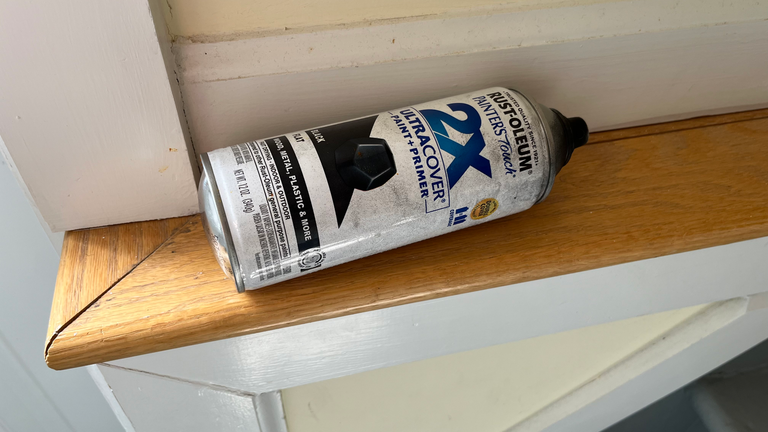 Paint tin buckled